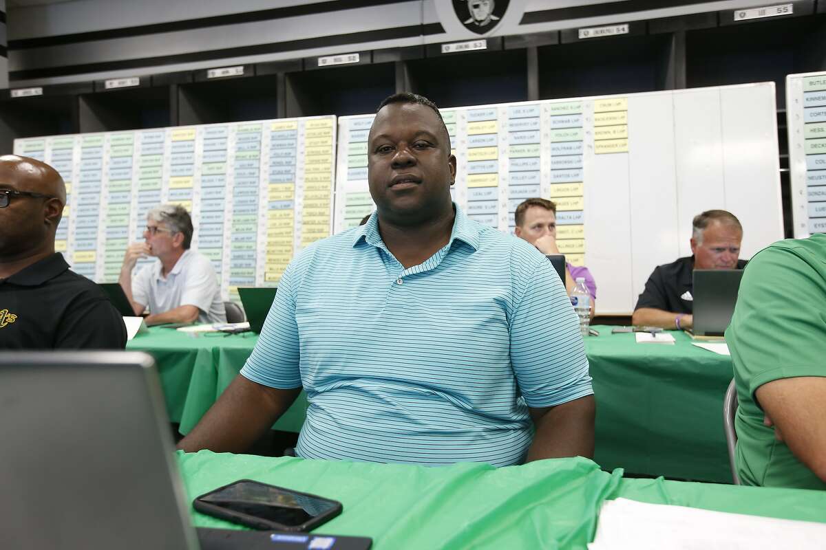 Assistant General Manager/Director of Player Personnel Billy Owens of the Oakland Athletics sits in the Athletics Draft Room on the opening day of the 2018 MLB Draft at the Oakland Alameda Coliseum on June 4, 2018 in Oakland, California.