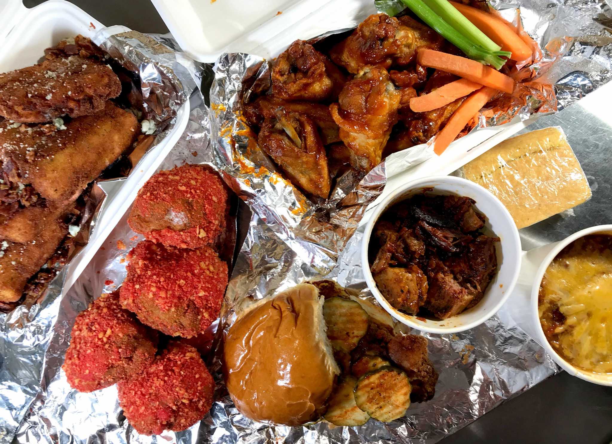 Wiz Khalifa’s HotBox by Wiz restaurant serves Flamin’ Hot Cheetocrusted mac and cheese with