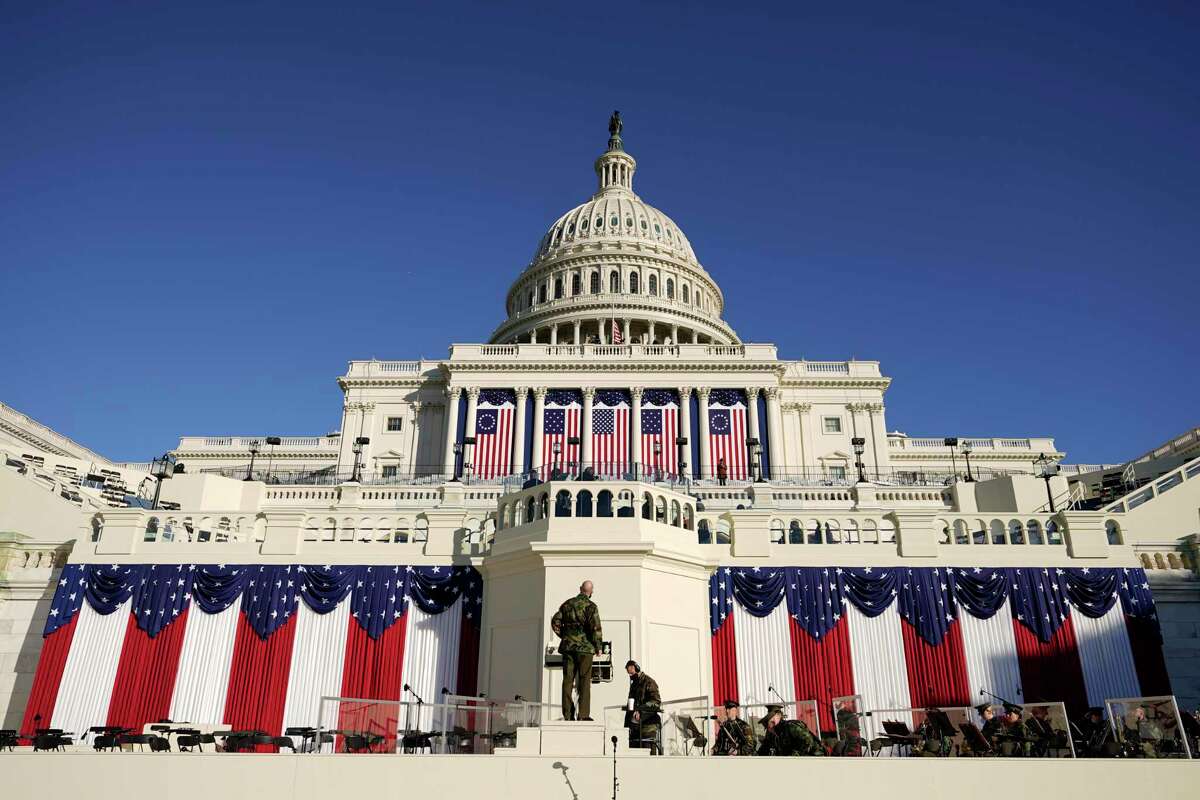 Final preparations are made ahead of the 59th Presidential Inauguration at the U.S. Capitol in Washington, Tuesday, Jan. 19, 2021. (AP Photo/Carolyn Kaster)