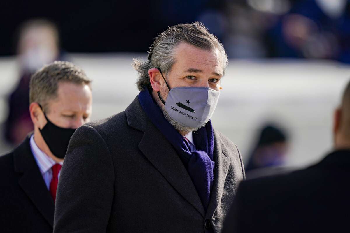 Sen. Ted Cruz, wearing a "Come and Take It"face mask, arrives at President Joe Biden's inauguration in a January file photo.