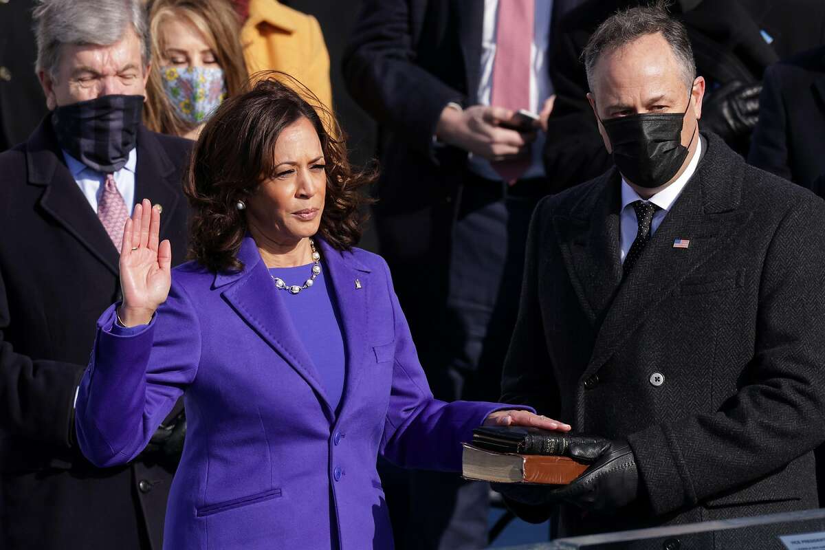 Kamala Harris is sworn as U.S. Vice President by U.S. Supreme Court Associate Justice Sonia Sotomayor as her husband Doug Emhoff looks on at the inauguration of U.S. President-elect Joe Biden on the West Front of the U.S. Capitol on January 20, 2021 in Washington, DC. During today's inauguration ceremony Joe Biden becomes the 46th president of the United States.