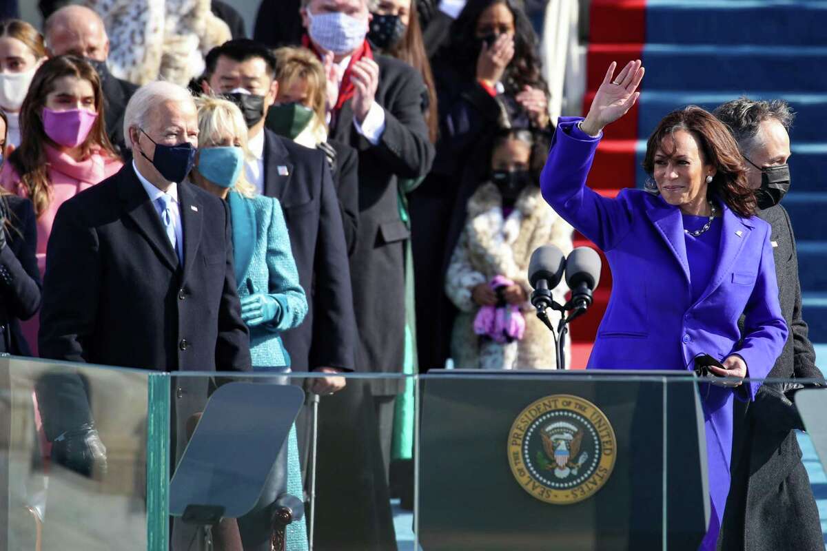 WASHINGTON, DC - JANUARY 20: Newly sworn in Vice President Kamala Harris waves to the crowd during the inauguration of U.S. President-elect Joe Biden on the West Front of the U.S. Capitol on January 20, 2021 in Washington, DC. During today's inauguration ceremony Joe Biden becomes the 46th president of the United States. (Photo by Rob Carr/Getty Images)