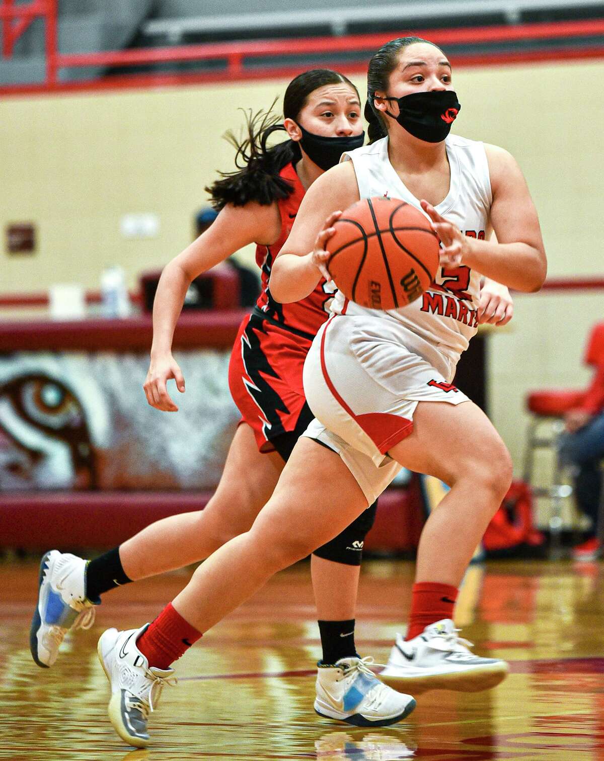 Martin High School Jari Garcia moves the ball down the court during a game against Rio Grande City High School Rattlers, Tuesday, Jan. 19, 2021, at Martin High School.