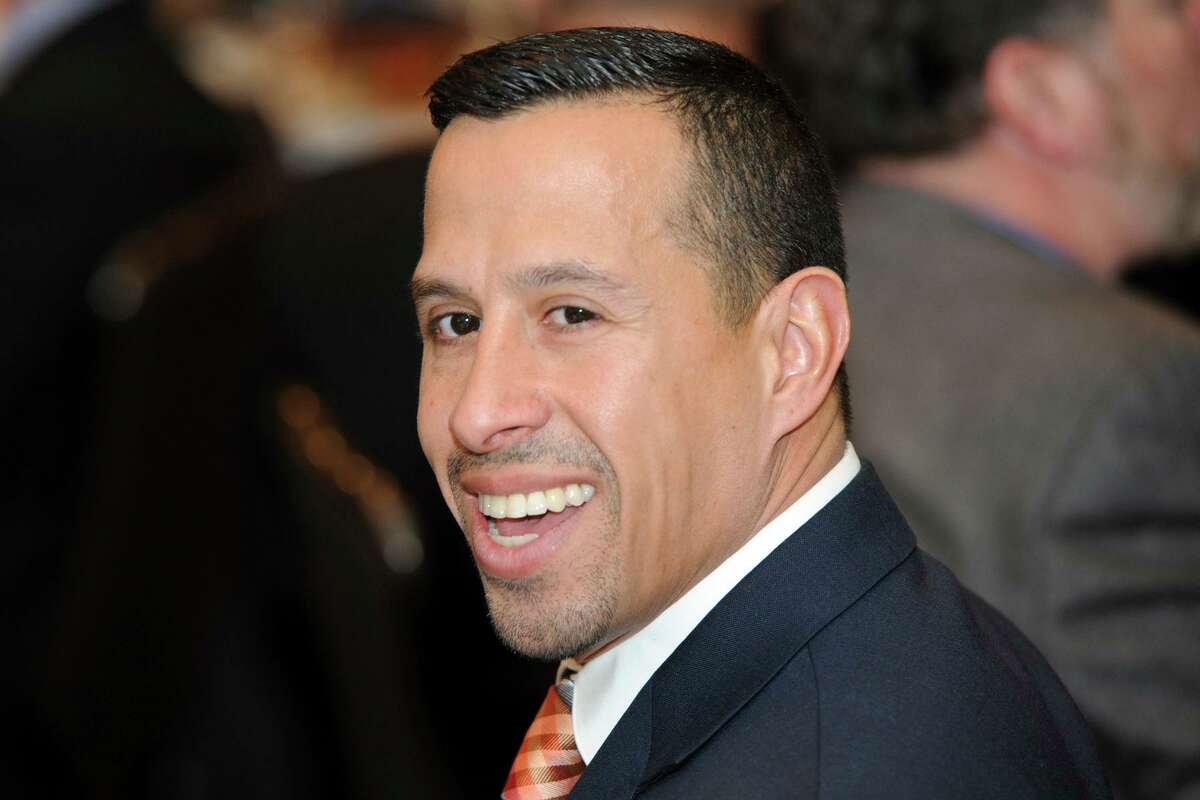 Danny Pizarro, an aide to the mayor, attends Mayor Joe Ganim's address to the Bridgeport Regional Business Council, in Bridgeport, Conn., on March 3, 2016. Police in Trumbull, Conn., are investigating a large gathering held over the weekend at the home of Pizarro, a Bridgeport city employee, authorities said. Pizarro, who works for Bridgeport’s housing code office, said he was celebrating his 48th birthday with over 300 guests when police showed up around 1 a.m. Sunday, Jan. 17, 2021. An executive order from Gov. Ned Lamont limits private indoor and outdoor gatherings to 10 people. Private hosts could be charged $500, with guests penalized $250. (Ned Gerard/Hearst Connecticut Media via AP)
