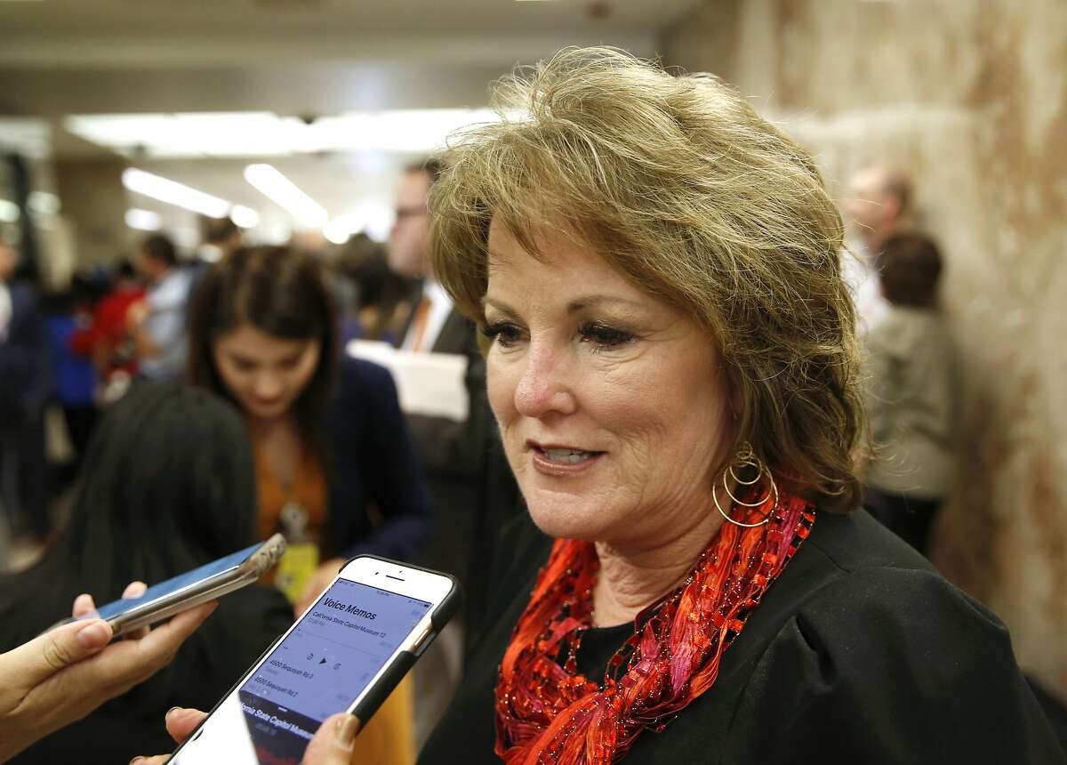 In this May 9, 2019, file photo, state Senate Republican Leader Shannon Grove, of Bakersfield, talks with reporters at the Capitol in Sacramento, Calif. Grove, who drew criticism after she promoted a conspiracy theory that Antifa activists attacked the U.S. Capitol, will be replaced as the Republican leader in the California Senate.