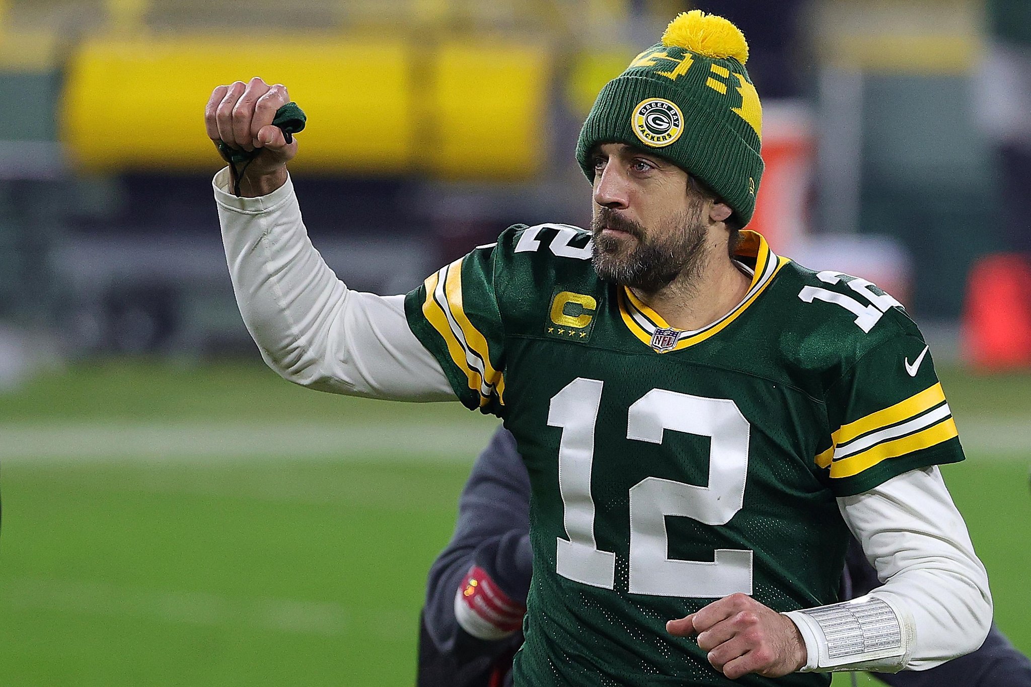 October 24, 2021: Green Bay Packers quarterback Aaron Rodgers #12 warms up  before the NFL football game between the Washington Football Team and the  Green Bay Packers at Lambeau Field in Green