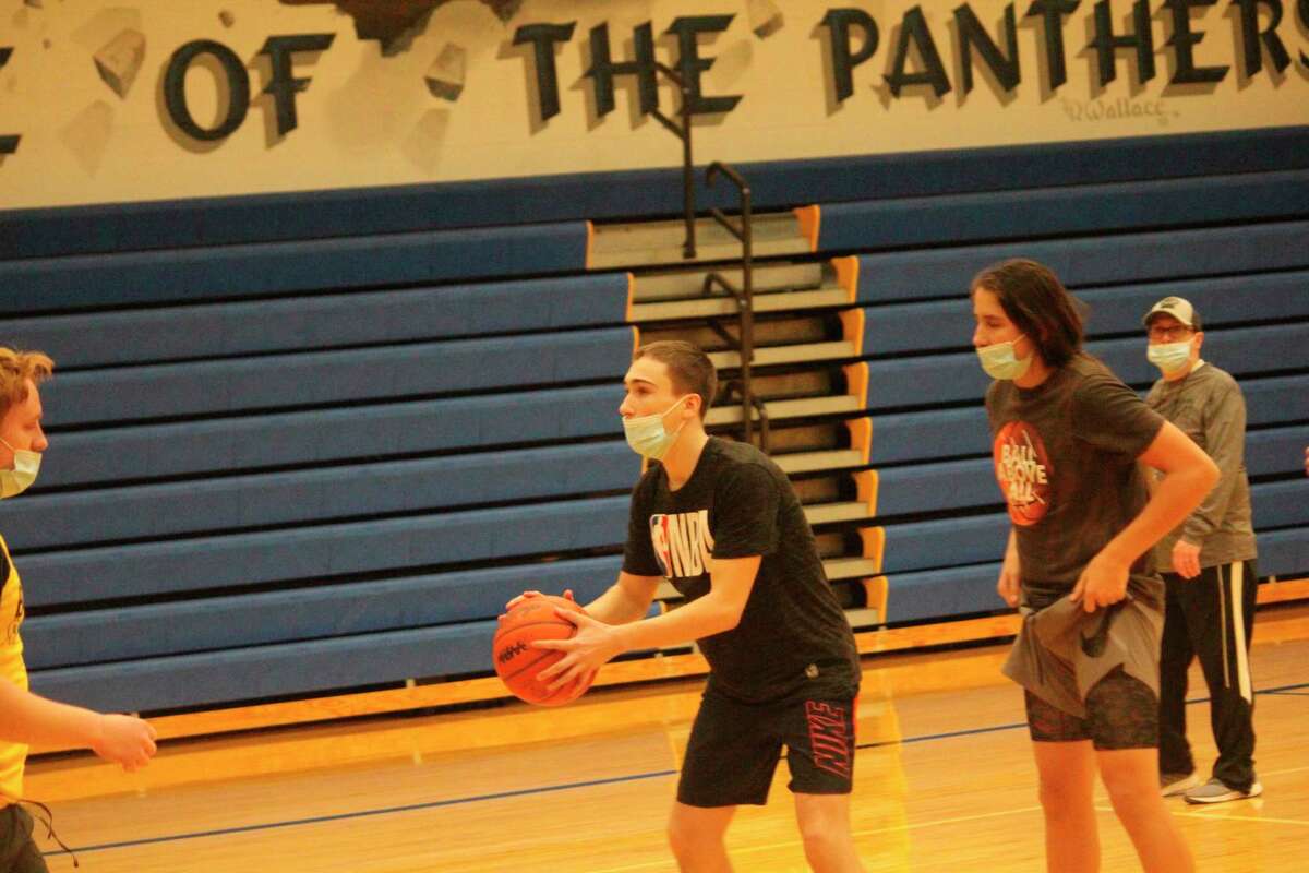 Baldwin senior Derek Mock works on his shooting during basketball practice on Saturday. (Star photo/John Raffel)