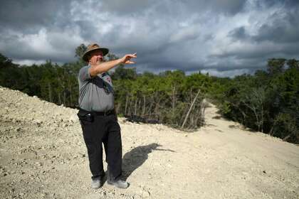 The tree inspector gets a hilltop view of the development site.