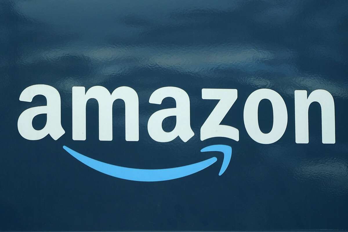 An Amazon logo appears on an Amazon delivery van, Thursday, Oct. 1, 2020.