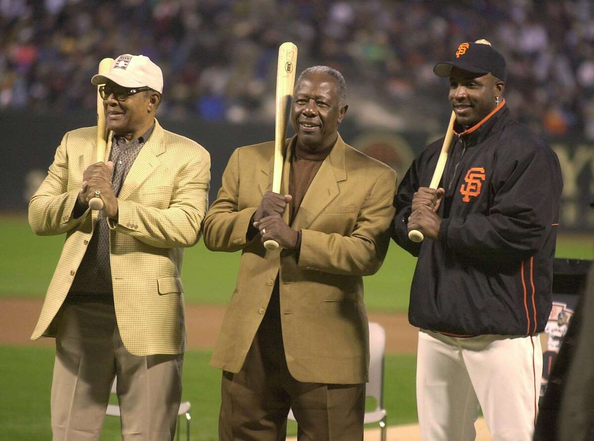 Willie Mays (left), Hank Aaron, and Barry Bonds — three of the greatest home run hitters of all-time — pose at Pac Bell Park in 2002, after Bonds had joined the 600 club.