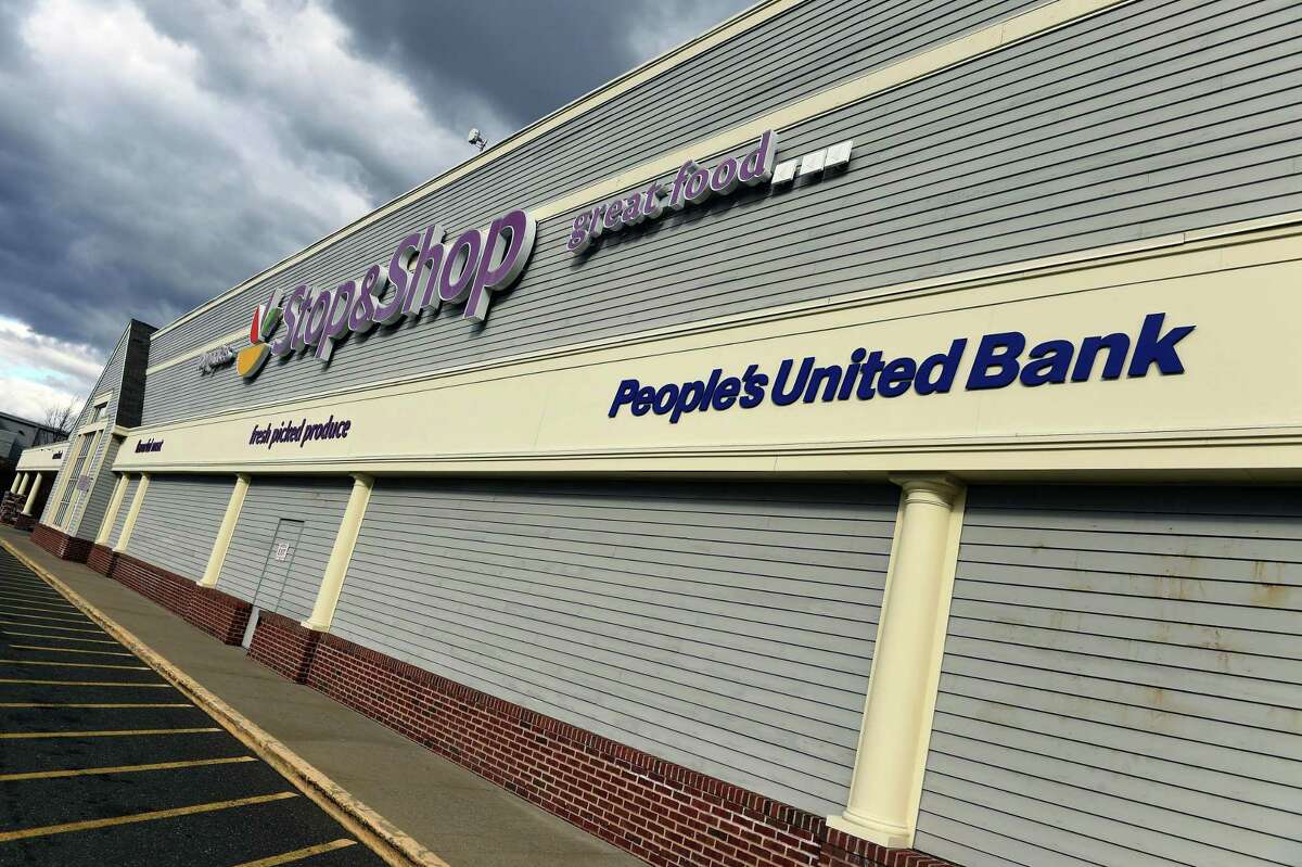 A People’s United Bank sign displayed outside of the Stop & Shop in Milford.