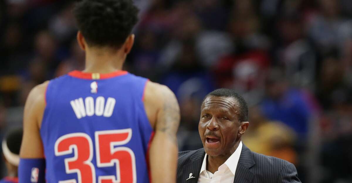 Dwane Casey of the Detroit Pistons talks to Christian Wood #35 of the Detroit Pistons during the first half of a game against the Brooklyn Nets at Little Caesars Arena on January 25, 2020, in Detroit, Michigan. (Photo by Duane Burleson/Getty Images)