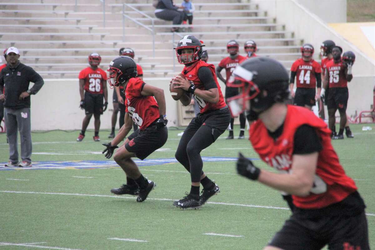 LU junior quarterback Jalen Dummett looks for a receiver during the team's first practice Friday at Provost Umphrey Stadium.