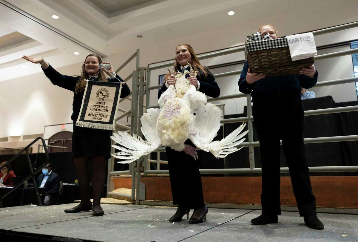 A Reserve Champion Turkey is auctioned off by exhibitor Hannah Cater during the 74th Annual Humble ISD Livestock Show and Auction held at the Humble Civic Center ballroom, Thursday, Jan. 21, 2021, in Humble.