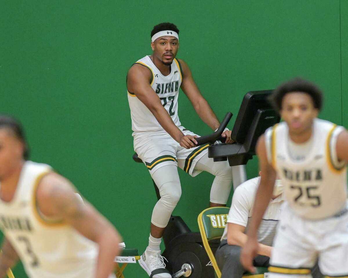 Siena College junior Jalen Pickett, who was making his first game back after an injury, stays loose while taking a breather during a Metro Atlantic Athletic Conference game against St. Peter's University at the Alumni Recreation Center on the Siena College campus in Loudonville, NY, on Friday, Jan. 22, 2021 (Jim Franco/special to the Times Union.)