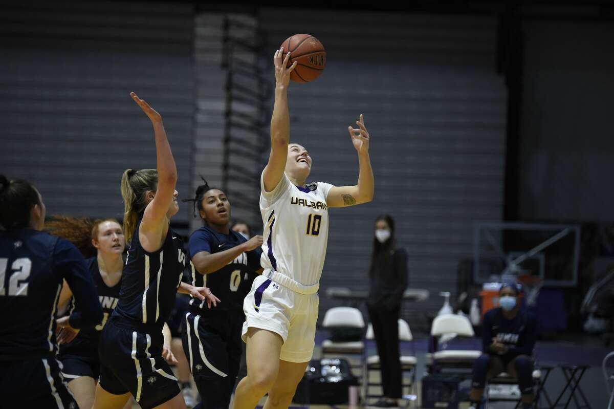 UAlbany's Ellen Hahne goes up for a shot against New Hampshire in an America East women's basketball game Saturday, Jan. 23, 2021, at SEFCU Arena in Albany. (Kathleen Helman/UAlbany athletics)