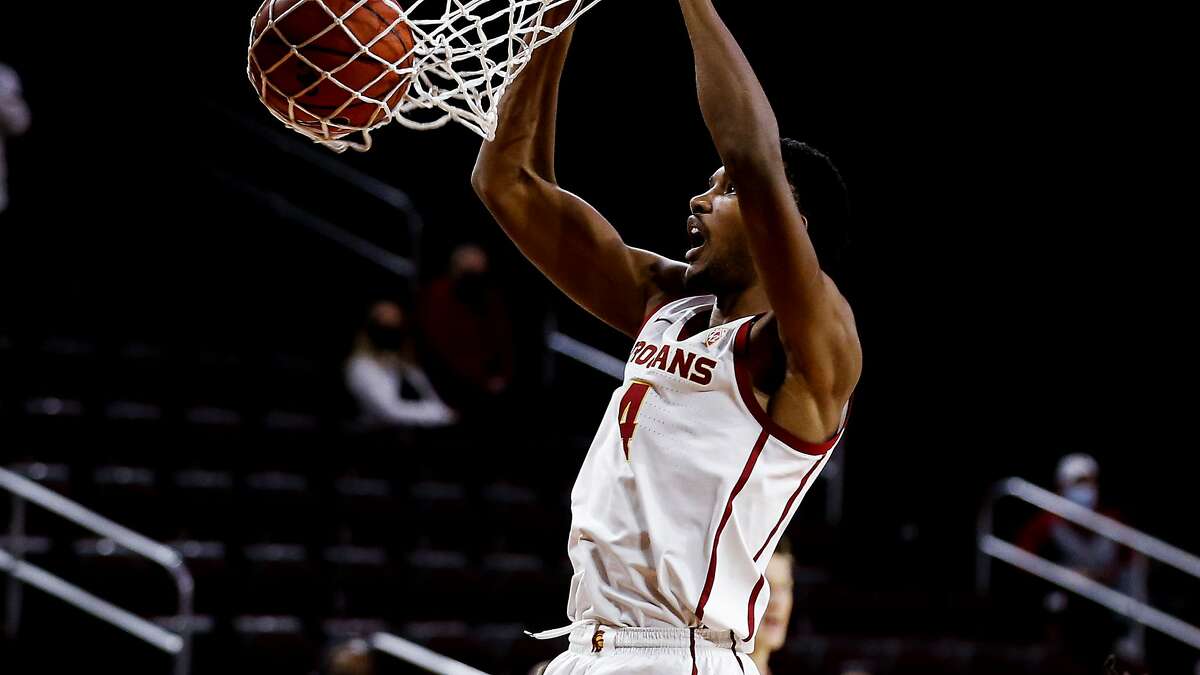 Southern California forward Evan Mobley (4) dunks during an NCAA college basketball game between Southern California and Washington State Saturday, Jan. 16, 2021, in Los Angeles. (AP Photo/Ringo H.W. Chiu)