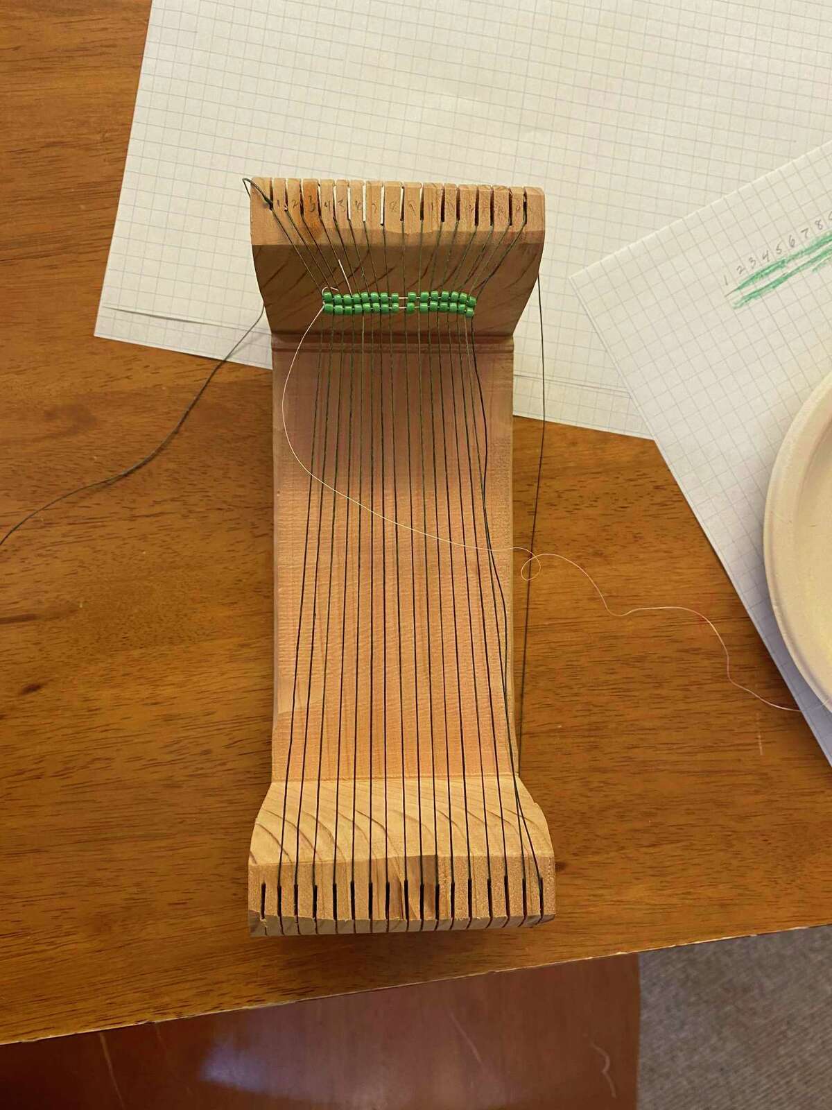 A beading loom. For example, in the plains region - the center of the United States - geometric shapes are used. More locally, beading tends to have floral patterns "because there are a lot more flowers in this region than there are out in the deserts," Kascak said. For more information on beading classes, visit the Institute, 38 Curtis Road, at iaismuseum.org. sfox@milfordmirror.com