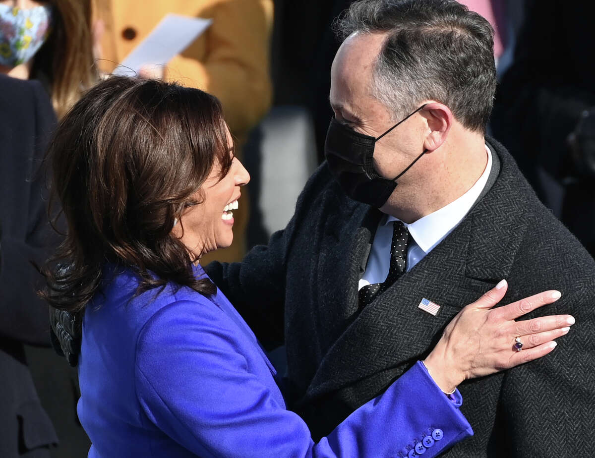 Kamala Harris is embraced by her husband Doug Emhoff after being sworn in as the 49th US Vice President by Supreme Court Justice Sonia Sotomayor on January 20, 2021, at the US Capitol in Washington, DC.