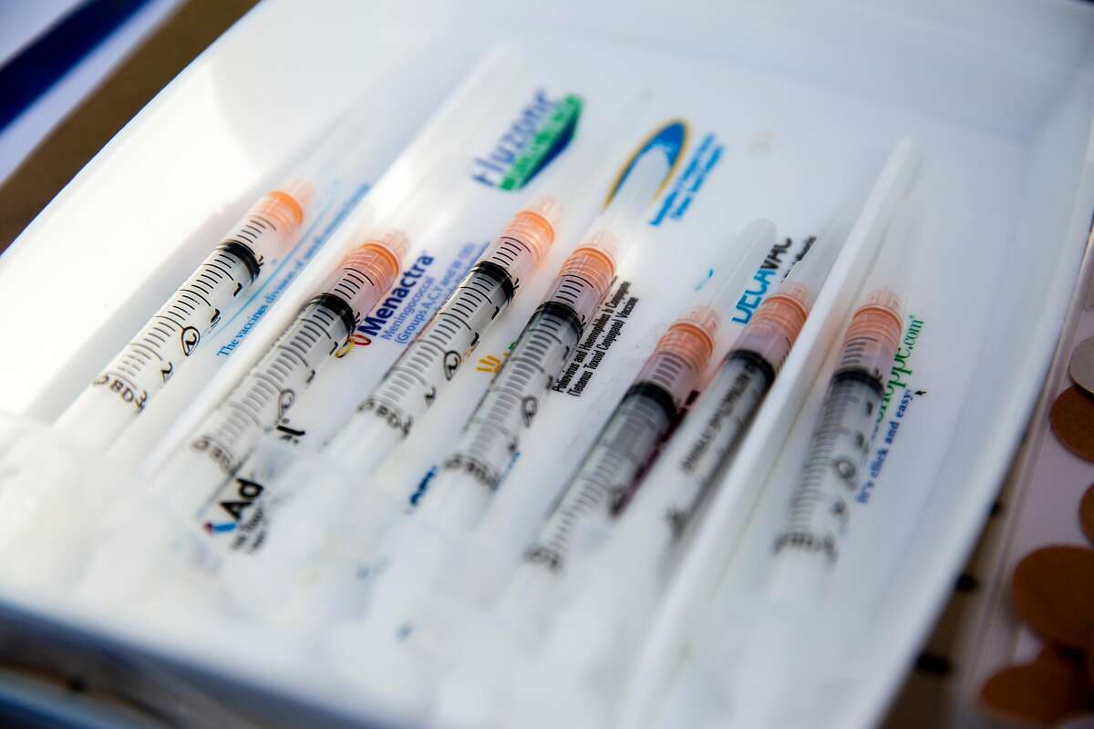 Syringes of the Moderna COVID-19 vaccine are lined up.Moderna is developing a booster vaccine.