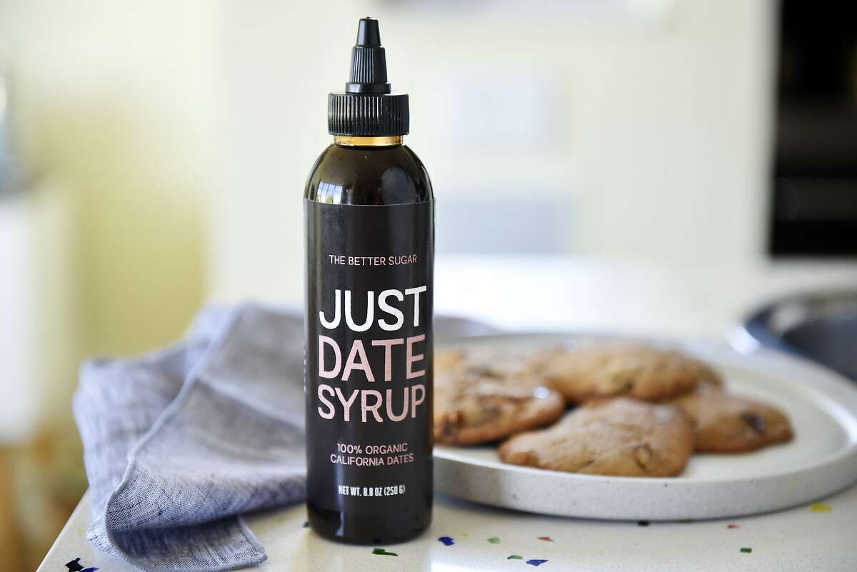 A bottle of Just Date Syrup sits on the counter. Just Date Syrup, made with organic California dates, won at the Good Food Awards again.