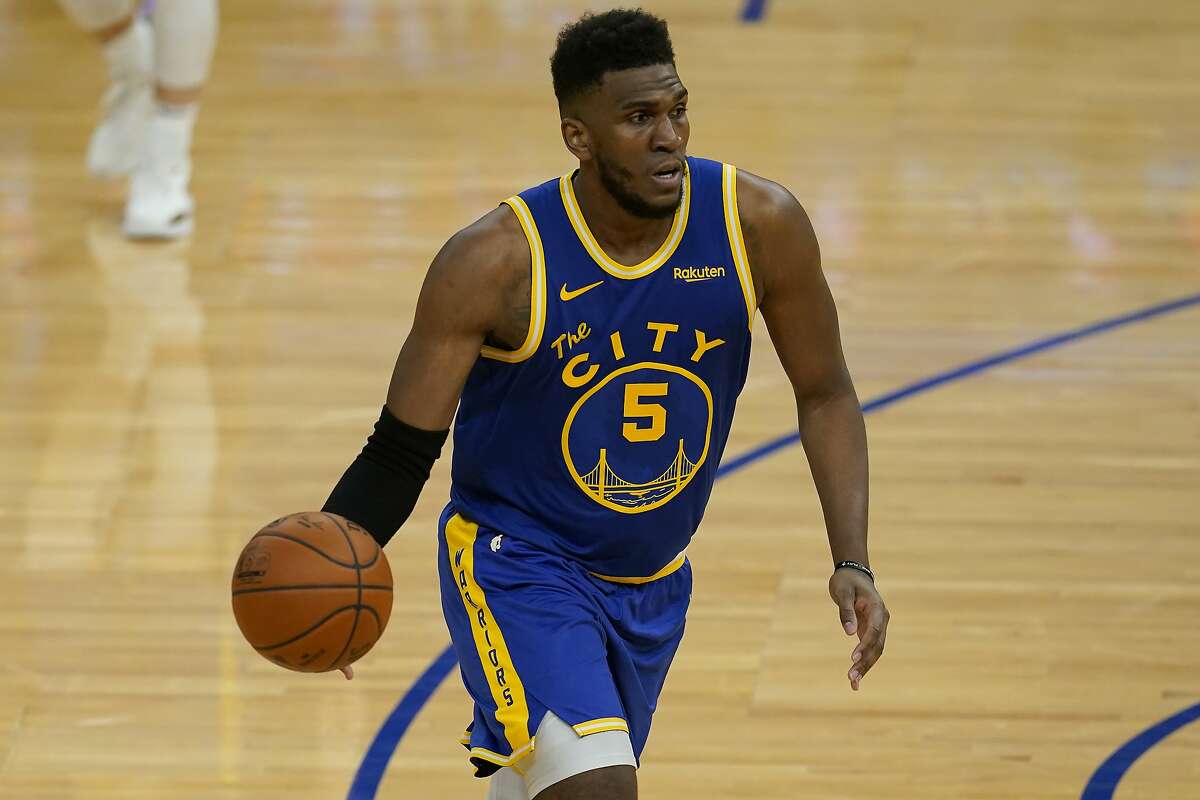 Golden State Warriors forward Kevon Looney (5) against the New York Knicks during an NBA basketball game in San Francisco, Thursday, Jan. 21, 2021. (AP Photo/Jeff Chiu)
