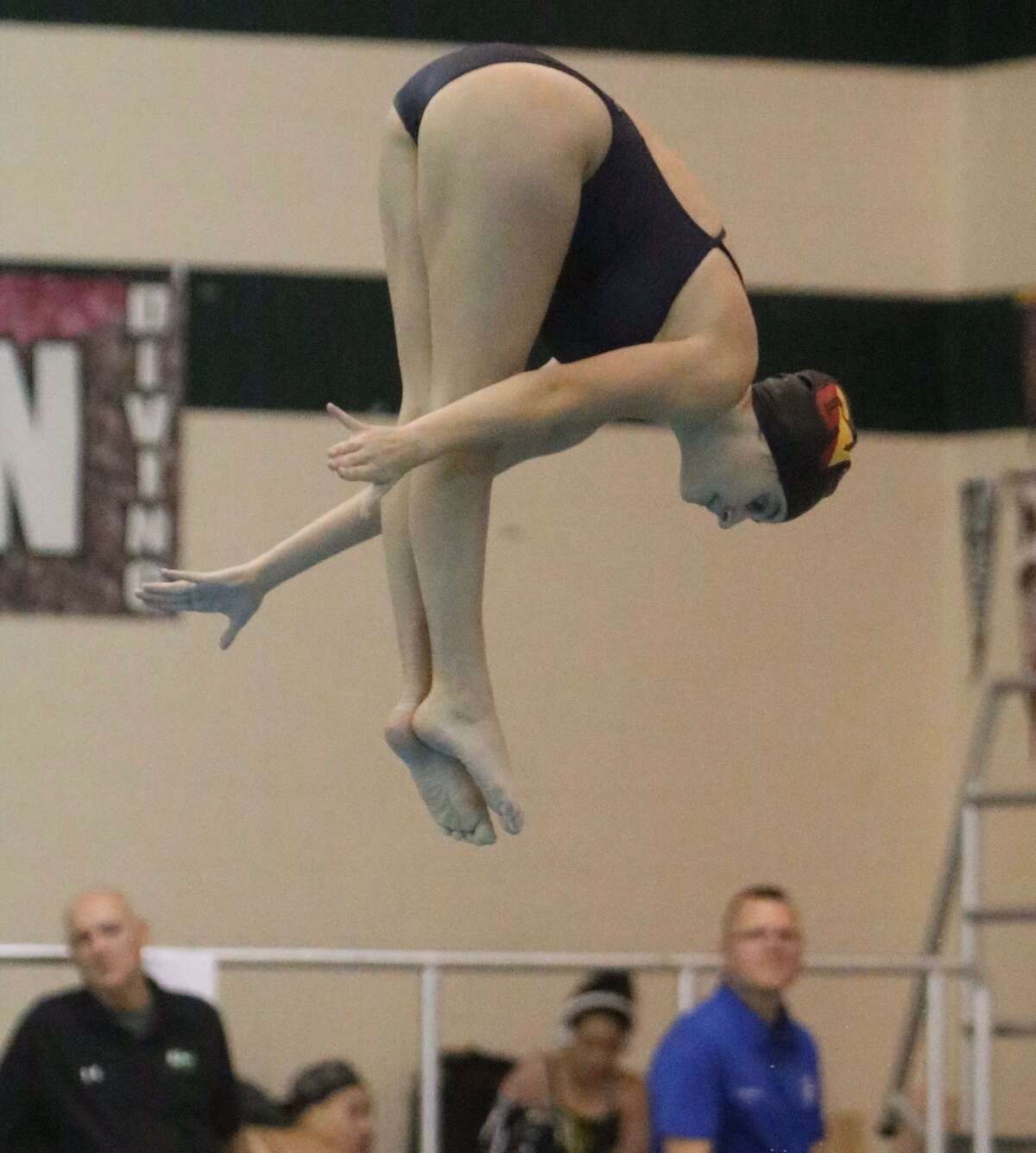Maddy Altieri of Guilderville competes in diving in high school.