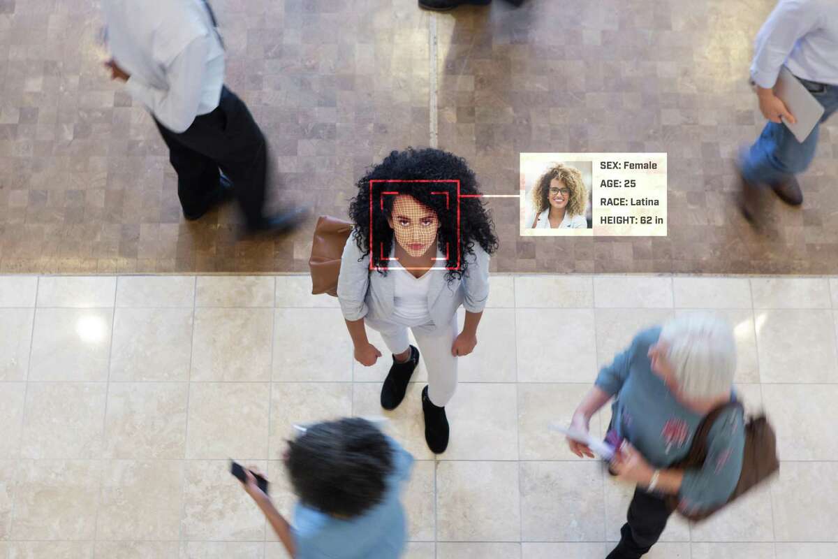 A woman stands in a lobby while a facial recognition scan describes her as a Latina, one of the pan-ethnic identifiers most used among women of Hispanic or Latino heritages, as opposed to Latinx, which is only accepted by 2 to 3% of these multicultural population.