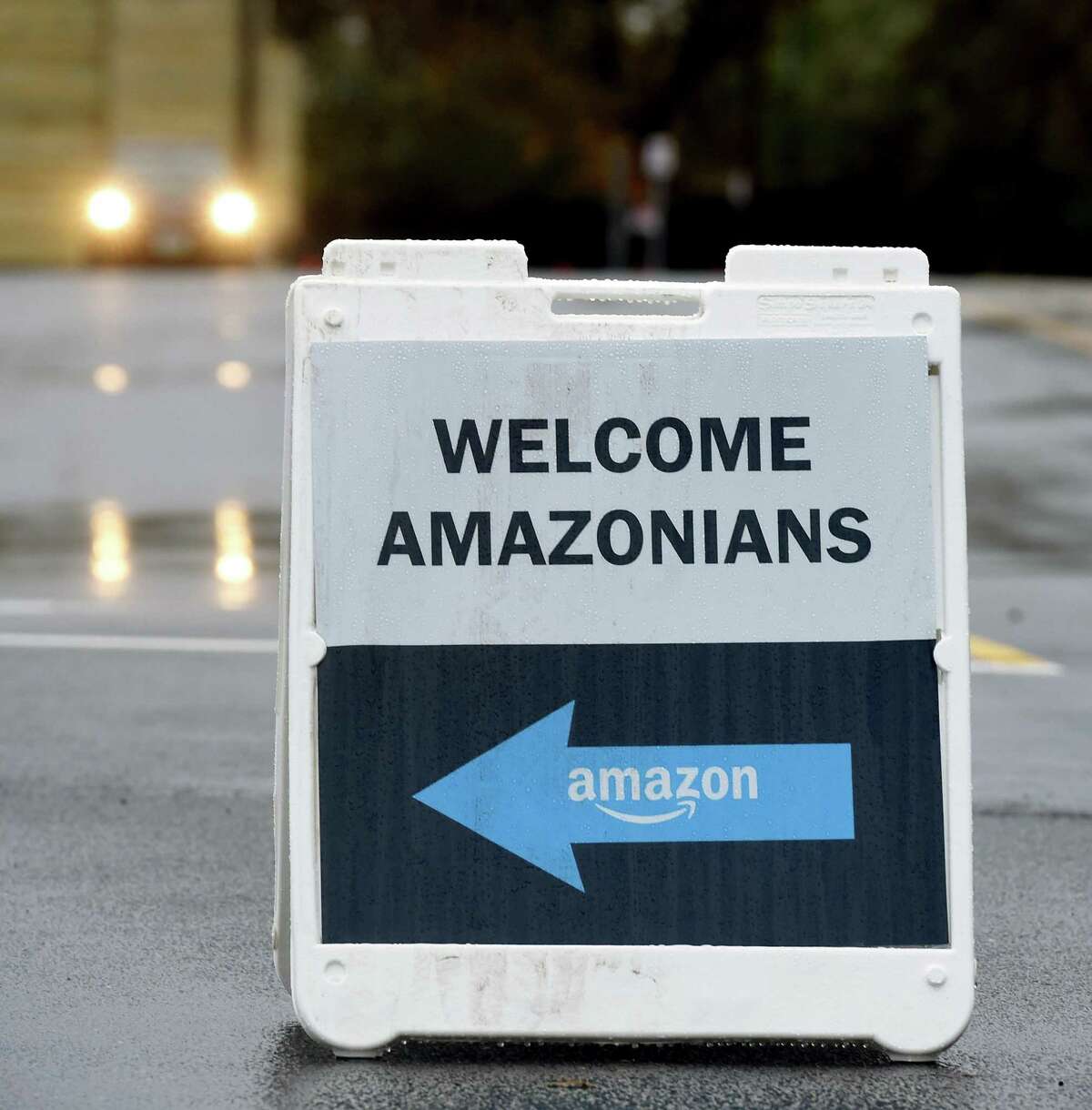 A sign welcomes Amazon employees at a new Amazon distribution facility at the former Lowe's on the Boston Post Rd. in Orange on October 28, 2020.