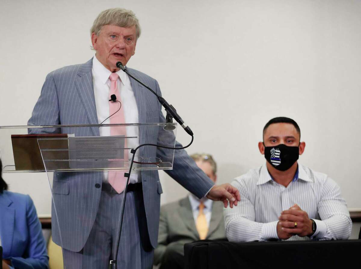 Rusty Hardin speaks during a press conference at Hilton Americas, in Houston, Tuesday, Jan. 26, 2021, to discuss the indictment handed down to Houston Police officer Felipe Gallegos, right, for his actions in the Harding Street case.