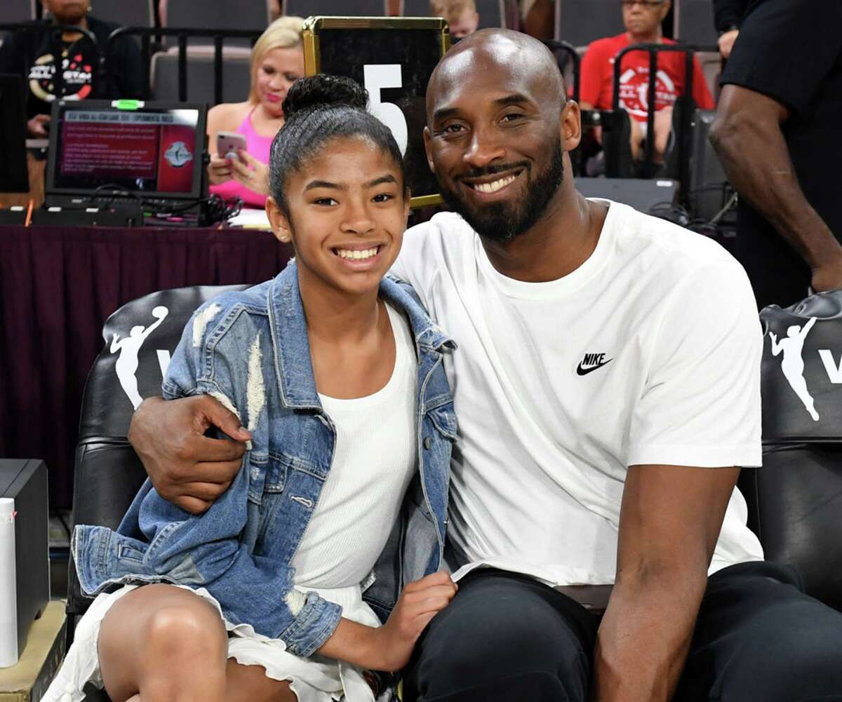 Gianna Bryant and her father, former NBA star Kobe Bryant, attend the 2019 WNBA All-Star Game in Las Vegas.