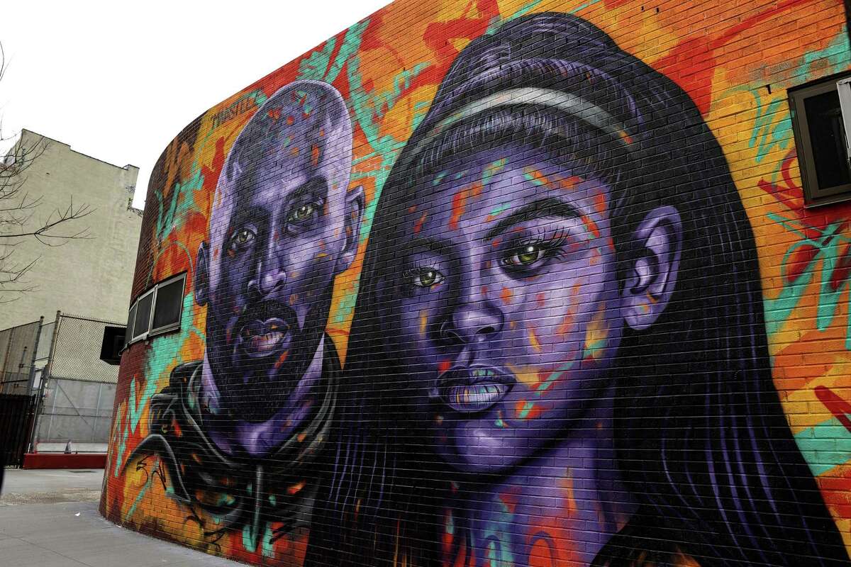 A view of a mural of Kobe Bryant and his daughter Gianna Bryant by artist Mark Paul Deren, aka MADSTEEZ, in Manhattan's Chinatown on Tuesday.