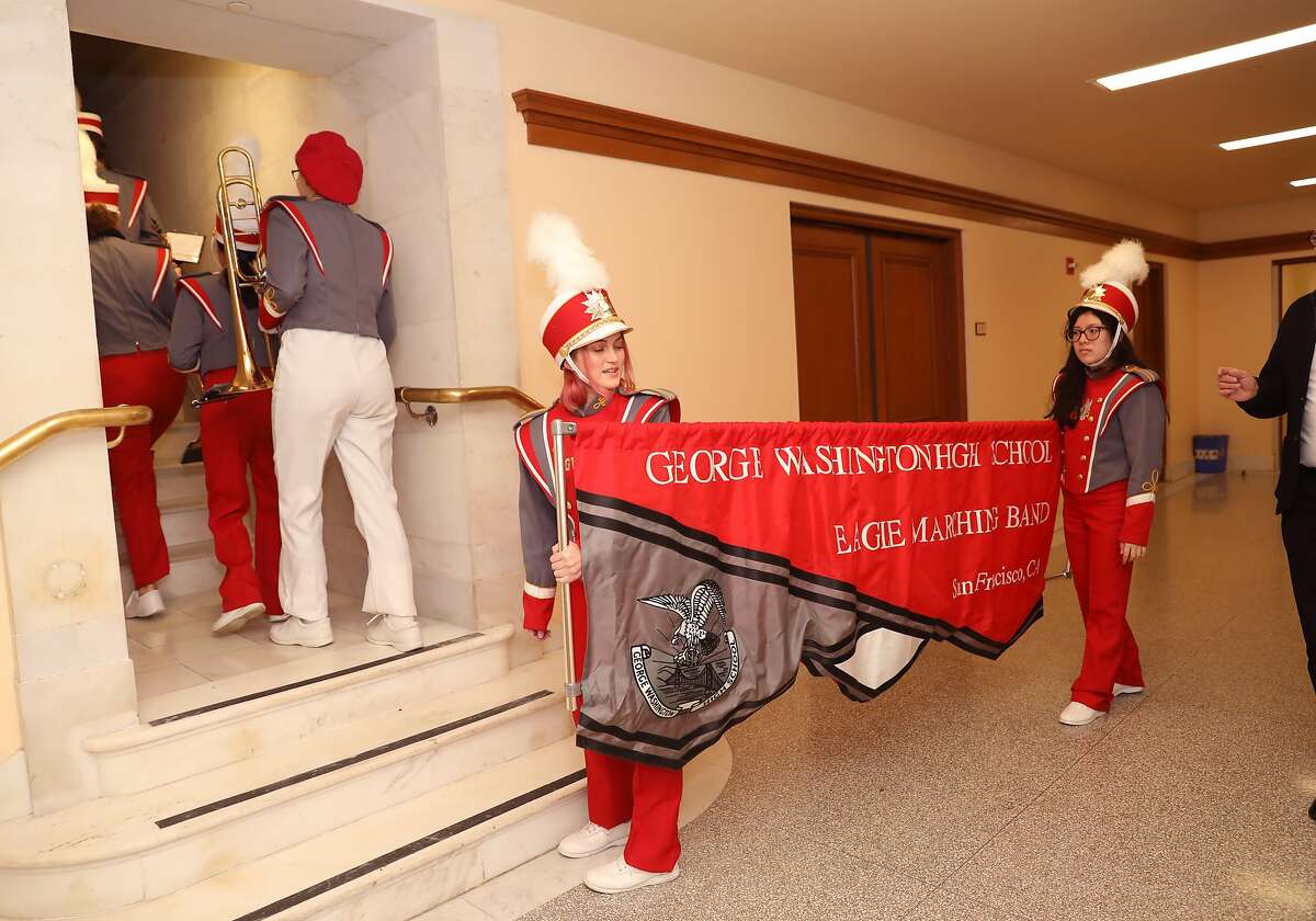 George Washington High School Eagle marching band head up the stairs to do the musical prelude to Mayor London BreedÕs inauguration at city hall on Wednesday, Jan. 8, 2020, in San Francisco, Calif.