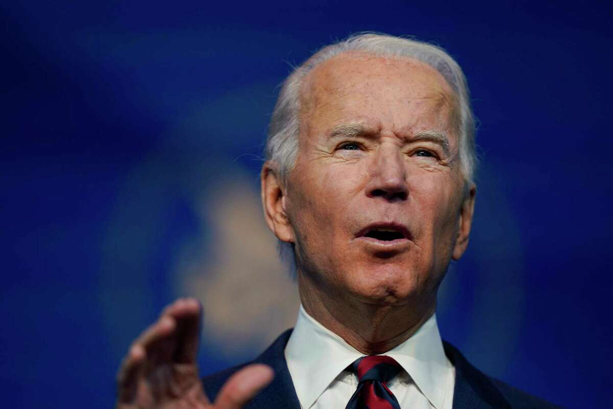 President-elect Joe Biden announces his climate and energy team nominees and appointees at The Queen Theater in Wilmington Del., Saturday, Dec. 19, 2020. (AP Photo/Carolyn Kaster)
