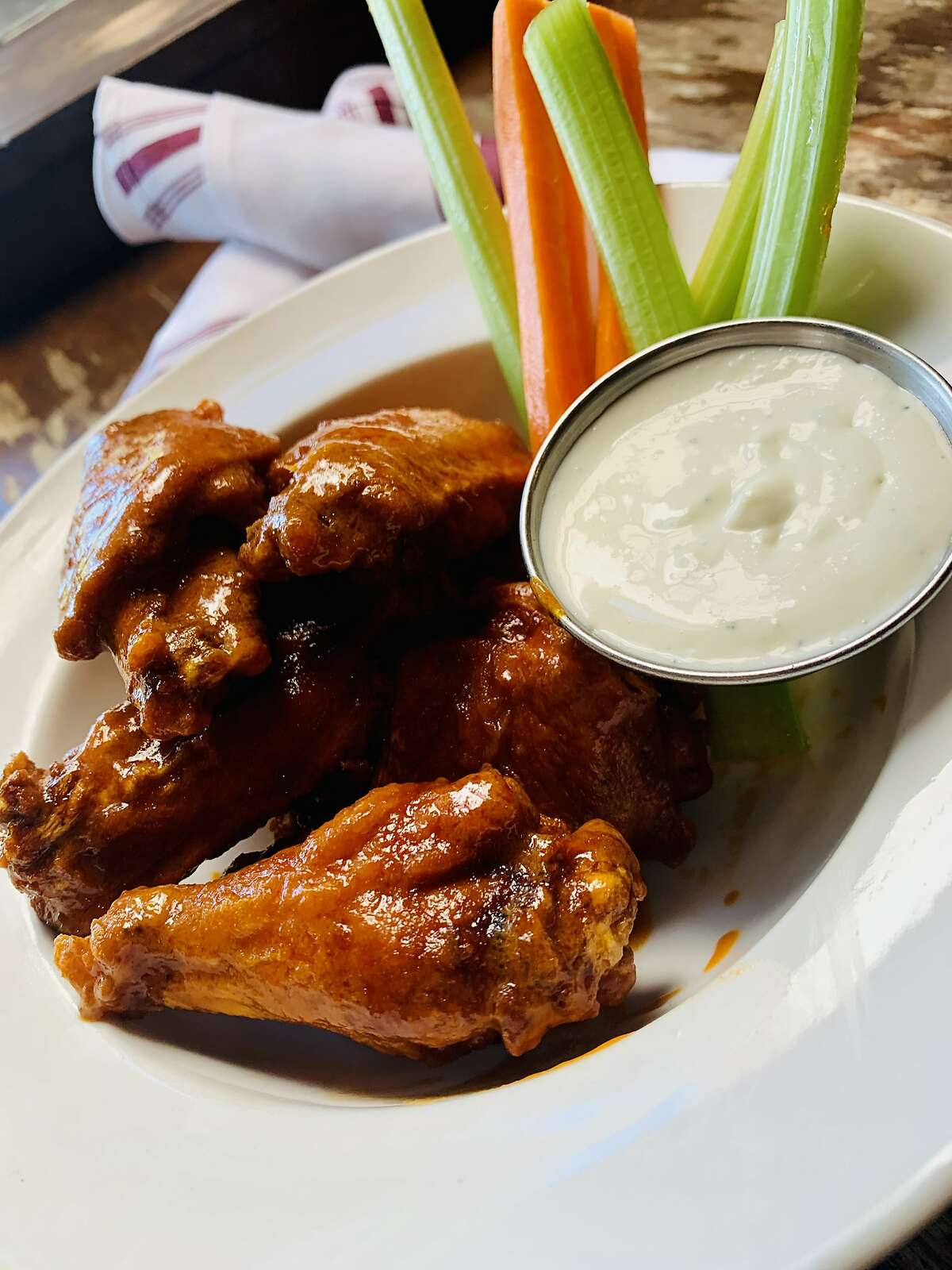 Buffalo chicken wings with blue cheese dressing from San Francisco restaurant Chao Pescao.