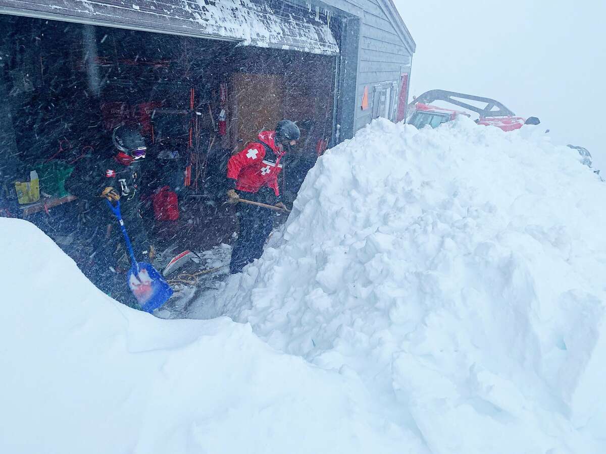 Ski patrollers shoveling snow at Kirkwood Ski Resort on Thursday, Jan. 28.