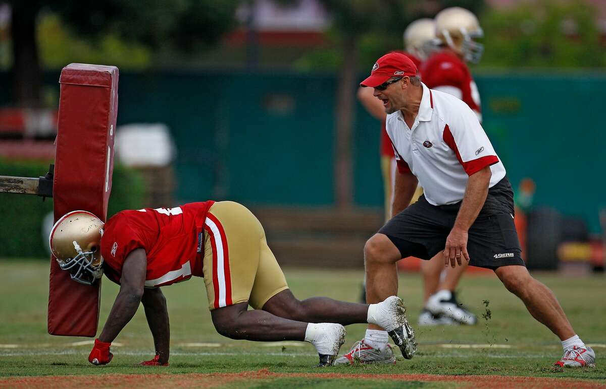 Running back Tom Rathman of the San Francisco 49ers looks on