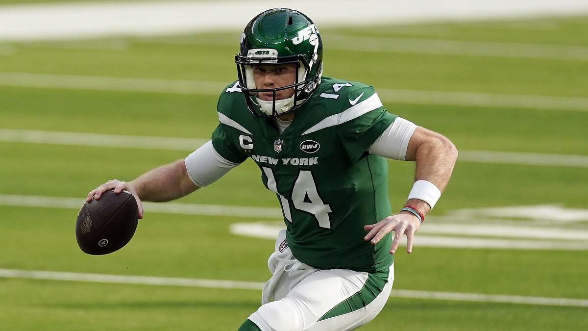 FILE: New York Jets quarterback Sam Darnold has a much smaller salary cap number than current 49ers quarterback Jimmy Garoppolo.