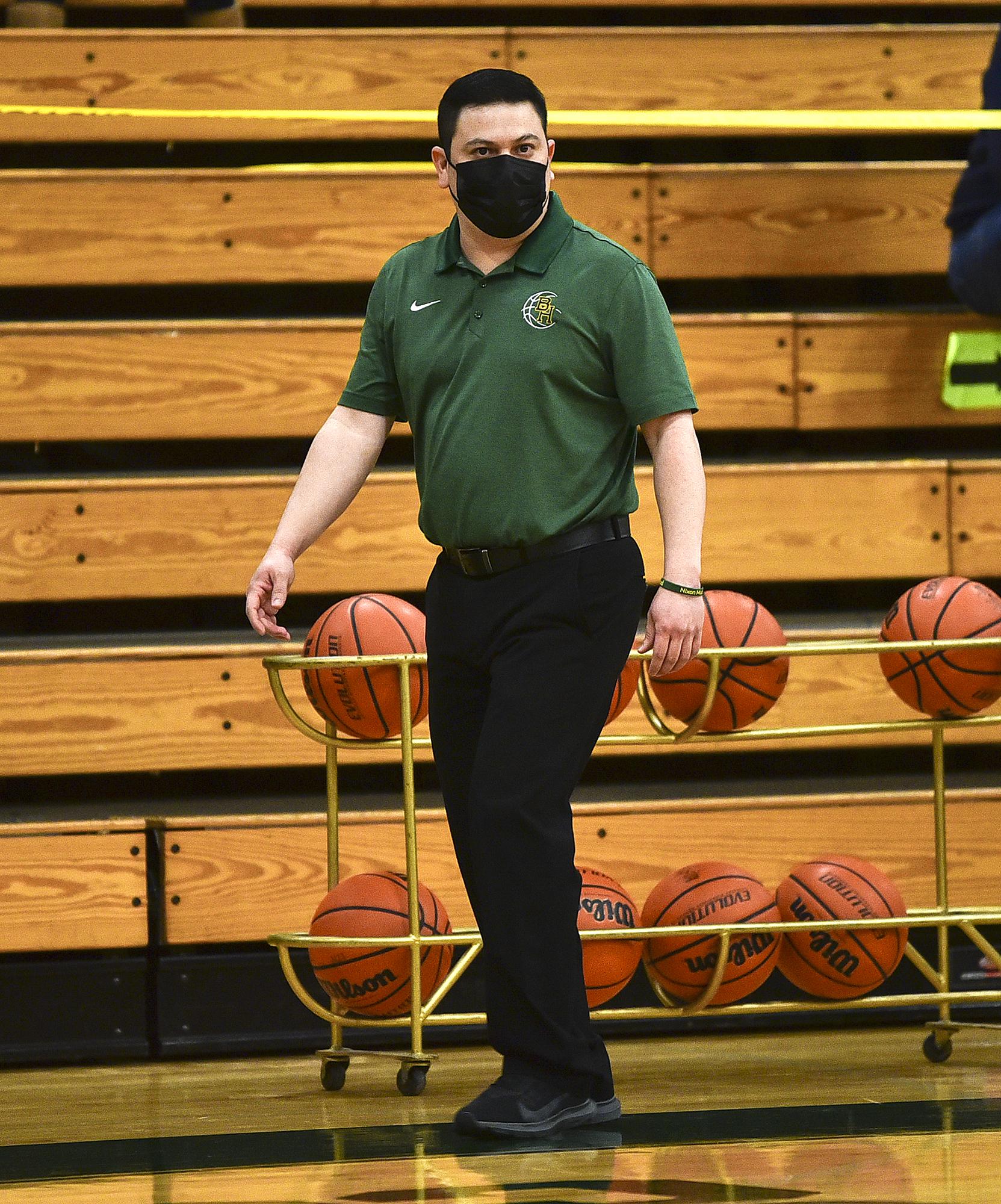 Where are the suits? Local high school basketball coaches go casual due