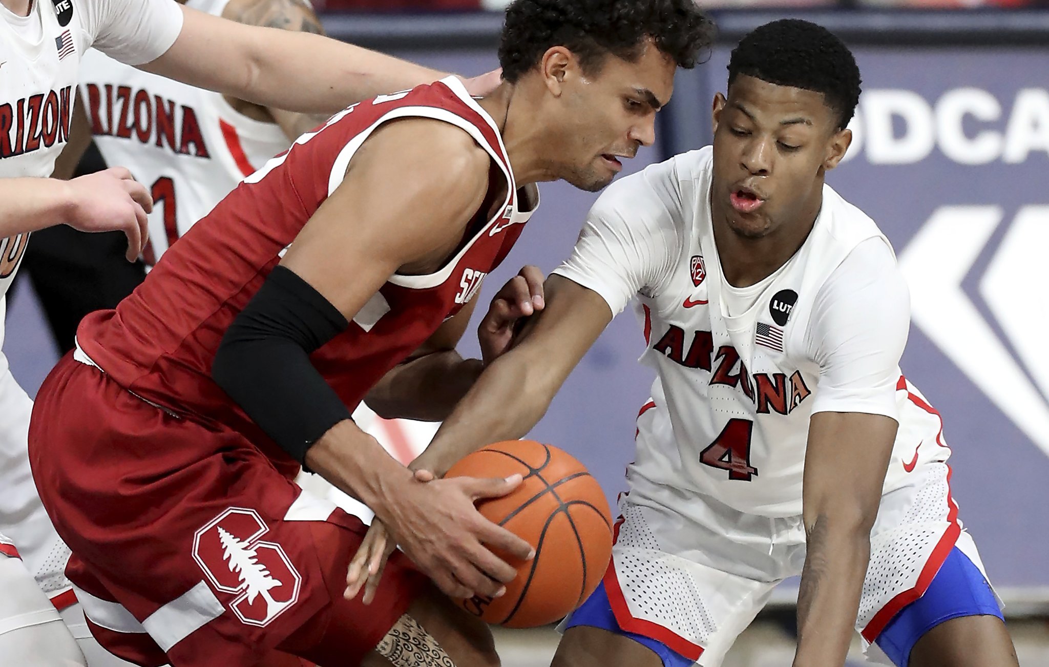 Delaire sparks late surge as Stanford beats Arizona 73-64