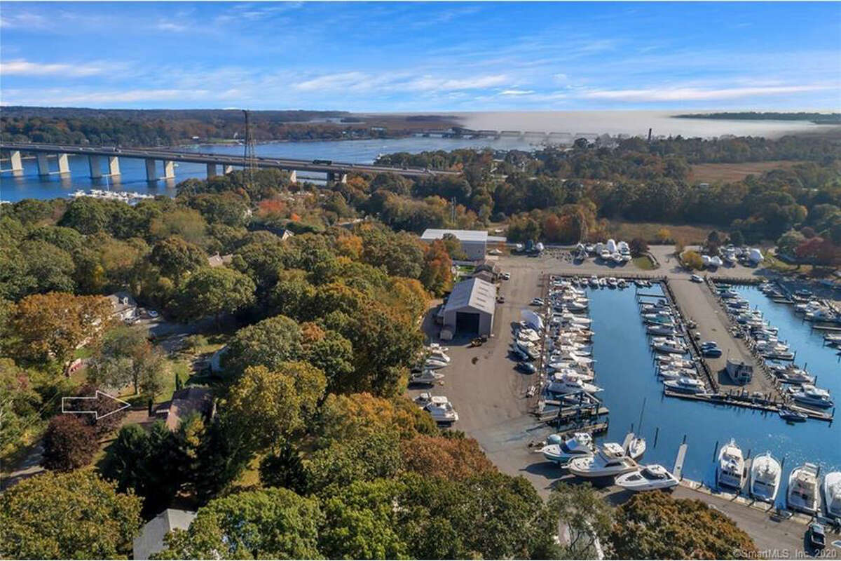 Aerial view of 5 Rocky Point Road, Old Saybrook. “See water from every window,” said Jodi Serapilia Siefken, one of the listing agents — and those window are plentiful. Co-listing agent Matt Diamond said some rooms have views of the marina and others the Connecticut River.