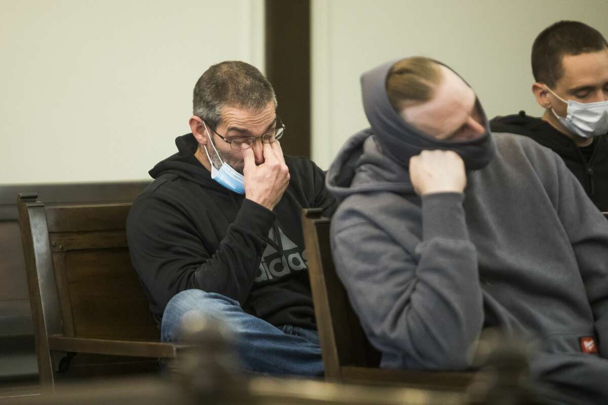 Greg Yancer wipes tears from his eyes during a ceremony celebrating his friend Matthew Wygant's graduation from the MiHope (Midland County Honest Opportunity Probation with Enforcement) program Friday, Jan. 29, 2021 at the Midland County Courthouse. (Katy Kildee/kkildee@mdn.net)