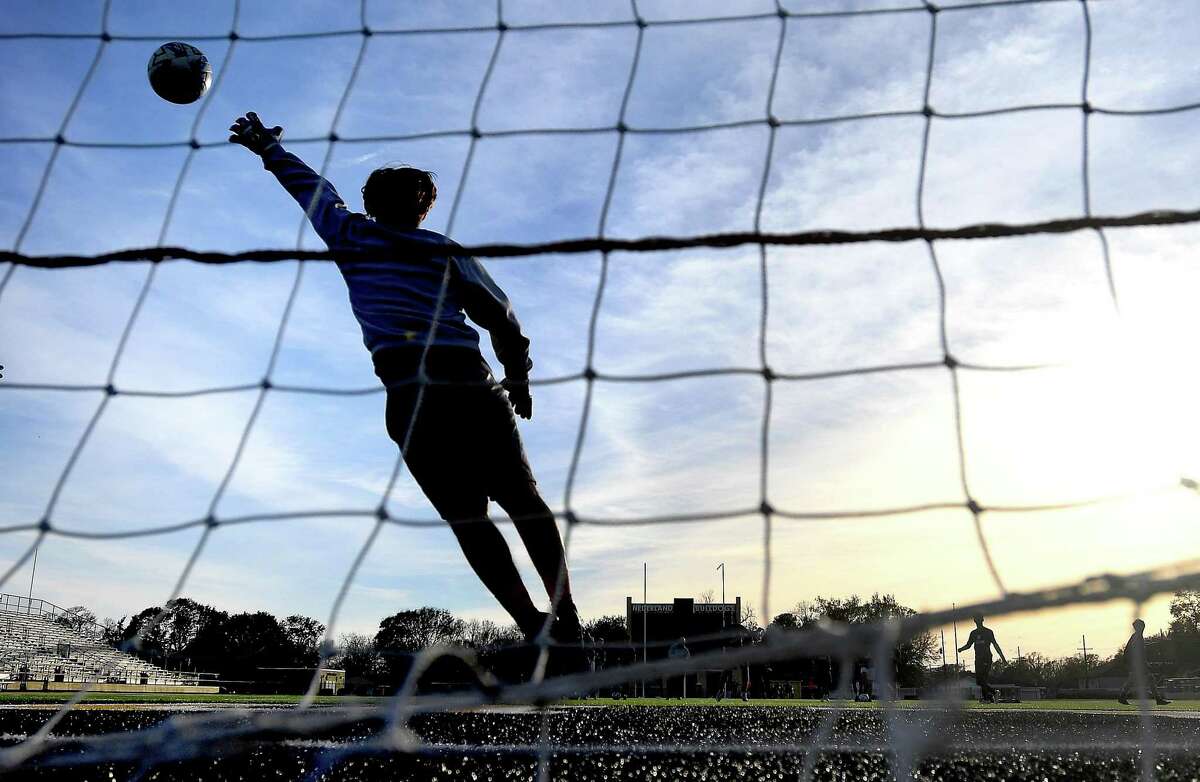 The Nederland boys soccer team practices at Bulldog stadium Wednesday as they get ready to dig into this seaon on the heels of a run cut short by COVID-19 last year. Photo taken Wednesday, January 27, 2021 Kim Brent/The Enterprise