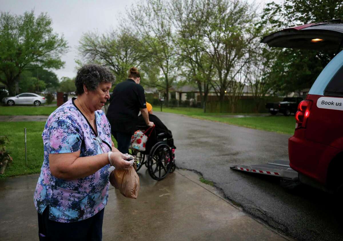 Mary Morris is a home health attendant, one of many caregivers taking care of more than a million sick and elderly Texans Friday, March 20, 2020, in South Houston, Texas. These caregivers are some of the most burdened in the health care industry; making little above minimum wage, often have multiple jobs, no paid sick leave, and are caring for the people most vulnerable to COVID-19