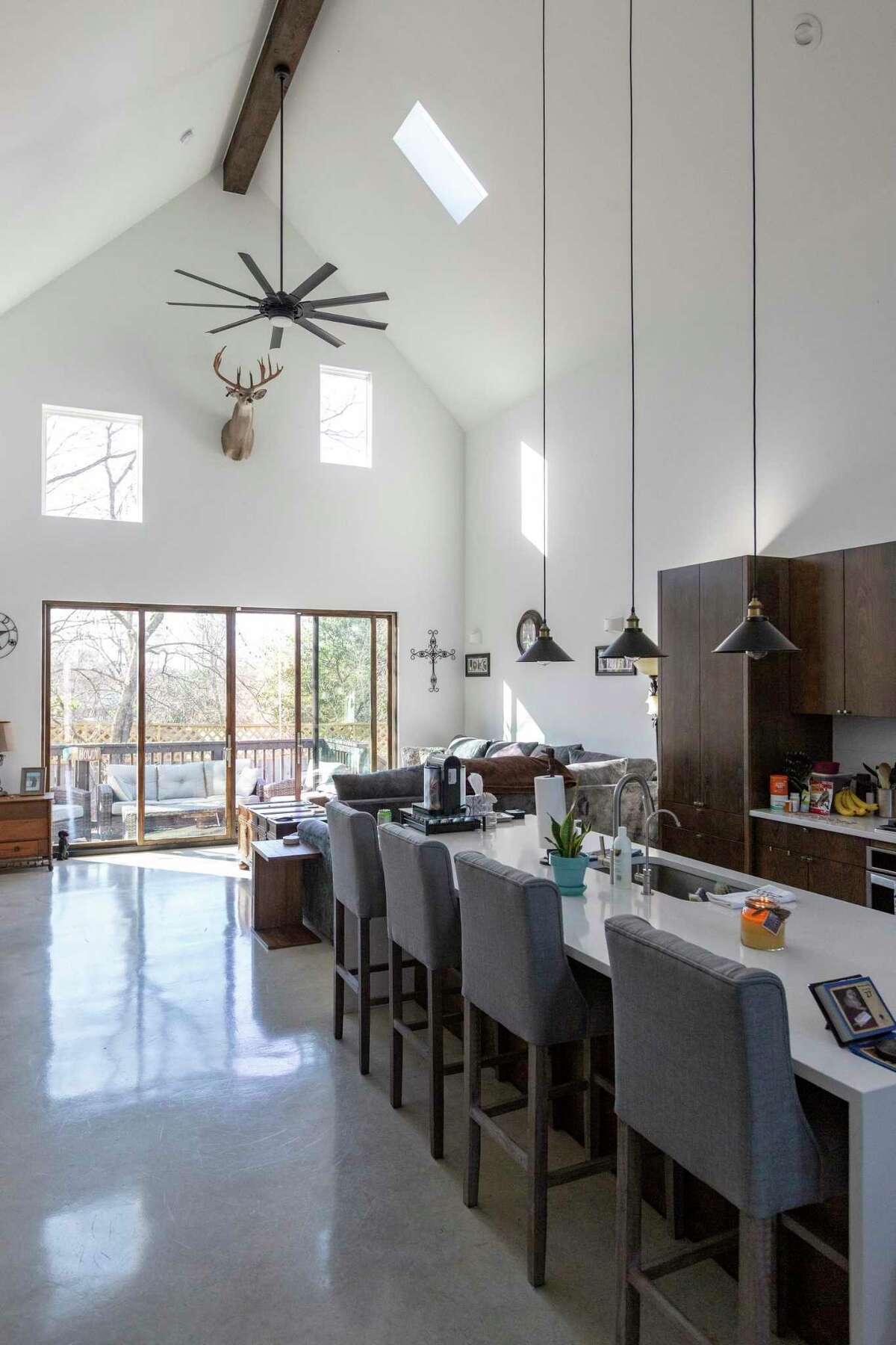 The living and kitchen areas of Jeanna Easley’s Alamo Heights home. It includes energy efficient features such as blown-in foam insulation and a tankless smart hot water heater.