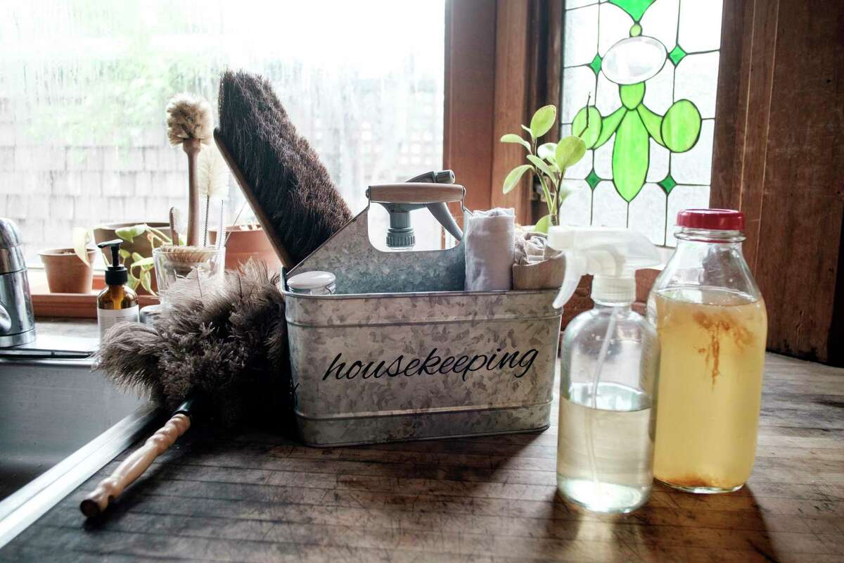 DIY, (Do It Yourself), cleaning products, including a spray bottle, and a milk bottle of homemade apple cider vinegar sit on the counter at the home in the United States in a previous year. One of the upcoming virtual happenings that is going to be available through the Wilton Library in Wilton, Connecticut, on Wednesdays in February, from 4 to 5 p.m., via the Zoom application, is a Junk Drawer STEM, (Science, Technology, Engineering and Mathematics), (Household STEM), program for children in the fourth grade through the sixth grade.