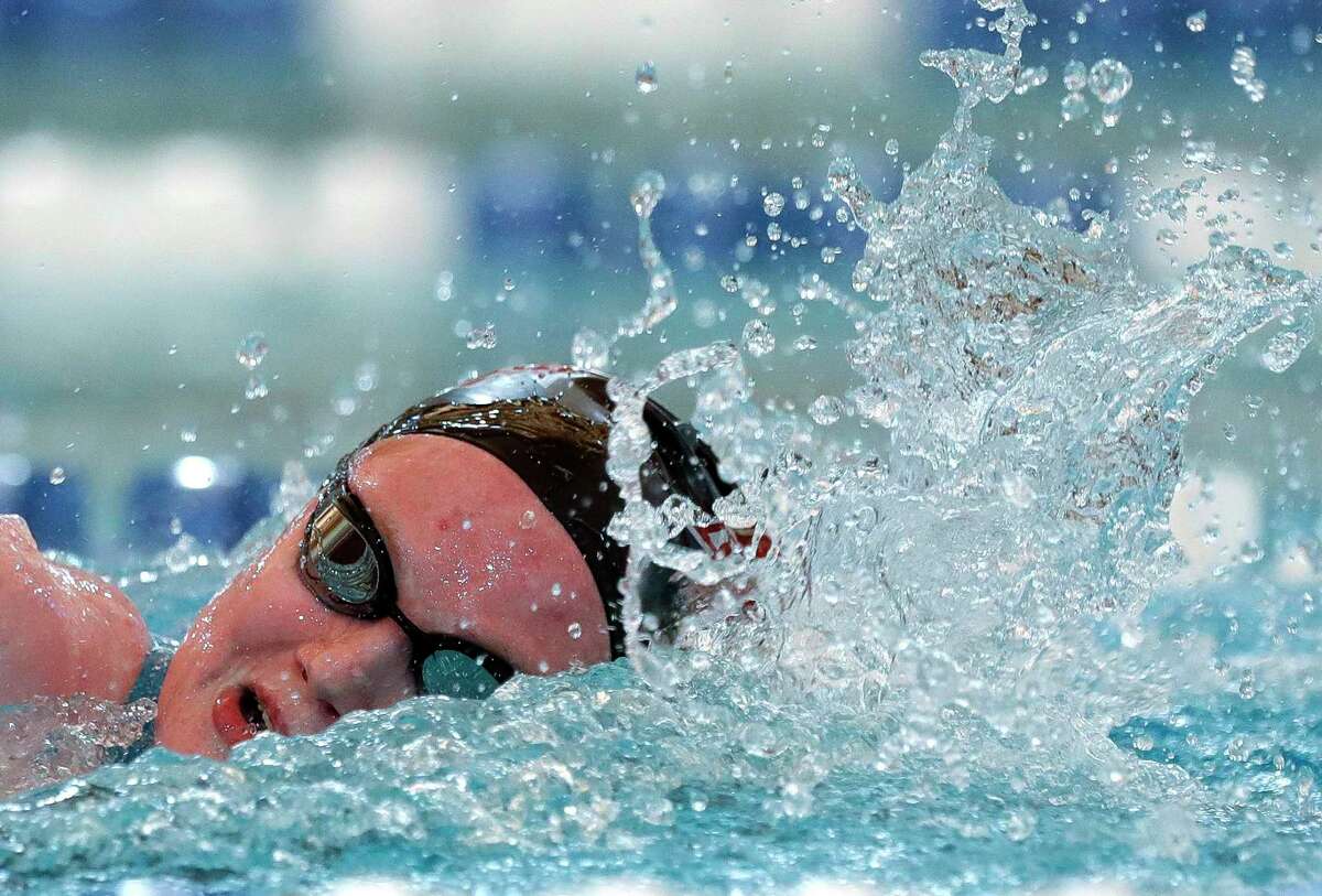 Kailey Turner of Magnolia competes in the girls 200-yard freestyle during the District 21-5A Swimming and Diving Championships at the Conroe ISD Natatorium, Friday, Jan. 29, 2021, in Shenandoah.