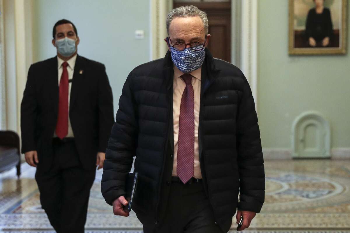 Senate Majority Leader Chuck Schumer (D-N.Y.) walks departs the Capitol in Washington on Wednesday, Jan. 27, 2021. (Oliver Contreras/The New York Times)