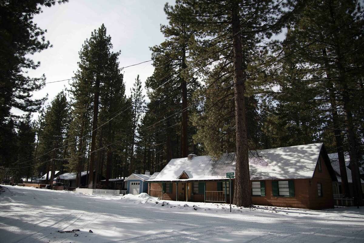 BEFORE: Residential areas in South Lake Tahoe, Calif., brace for an impending winter storm on Jan. 26, 2021.