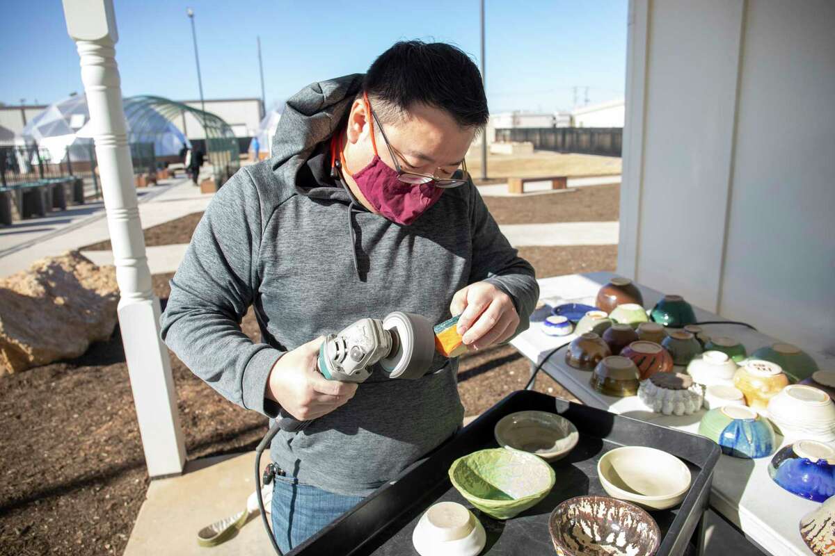 Volunteers prepare for West Texas Food Bank???s Empty Bowls fundraiser event Saturday, Jan. 30, 2021 at the WTFB???s Innovative Gardens. Jacy Lewis/ Reporter-Telegram